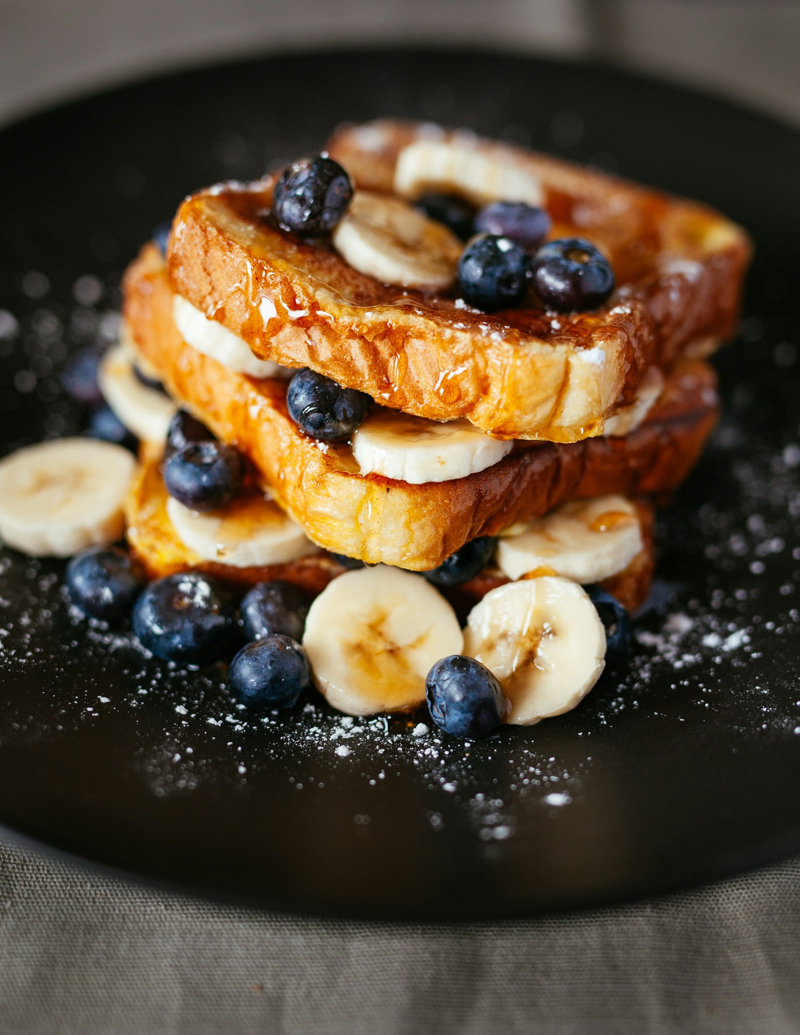 Texas-style French toast with bananas and blueberries